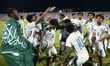 Players of Saudi Arabia celebrate after winning the Arab Gulf Cup Football Federation (AGC...