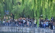 A large number of tourists visit the ancient imperial garden of the Summer Palace in Beiji...