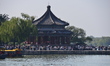 A large number of tourists visit the ancient imperial garden of the Summer Palace in Beiji...