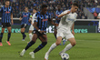 Nicolo Tresoldi of Club Brugge competes for the ball with Honest Ahanor of Atalanta BC dur...