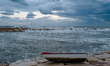 Wind and storm surge occur on Cala Sant'Andrea, in Molfetta, Italy, on October 3, 2025. Ap...