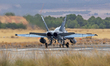 McDonnell Douglas EF-18M Hornet aircraft of the Spain Air Force head towards the runway at...