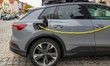 An electric AUDI vehicle charges at a public charging point in Neumarkt in der Oberpfalz,...