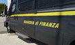 A close-up of an Italian Guardia di Finanza riot control van highlights law enforcement ve...