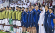 Qatar head coach Julen Lopetegui, his staff, and substitutes line up before the FIFA World...