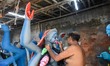 Artists give final touches to idols of Goddess Kali at a potters hub in Kolkata, India, on...