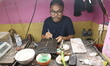 Goldsmiths work on crafting gold ornaments at a workshop ahead of Dhanteras, a Hindu festi...