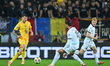 Valentin Mihaila of Romania and Stefan Posch of Austria play during the FIFA World Cup 202...