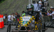 Participants race along the track during the 2025 Soapbox Derby at the Sasana Budaya Ganes...