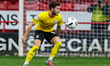 Charlie McCann of Barrow is in action with the ball during the Sky Bet League 2 match betw...