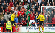 Wyll Stanway of Barrow gets up to punch the ball away during the Sky Bet League 2 match be...
