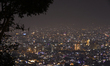 A long exposure shot captures the Kathmandu Valley illuminated with lights on the eve of t...