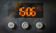 An oven clock is seen in Warsaw, Poland on 23 October, 2025. On the night from Saturday to...