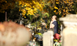 In Krakow, Poland, on October 23, 2025, people clean graves at Rakowicki Cemetery during p...