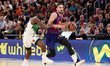 Tomas Satoransky of FC Barcelona is in action with Sylvain Francisco of Zalgiris Kaunas du...
