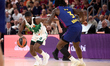 Sylvain Francisco of Zalgiris Kaunas competes with Myles Cale of FC Barcelona during the E...