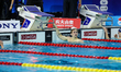 In Toronto, Ontario, Canada, on October 23, 2025, American swimmer Carson Foster checks th...