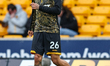 Ki-Jana Hoever of Wolverhampton Wanderers warms up during the Premier League match between...