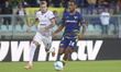 Antoine Joseph Bernede of Hellas Verona FC competes for the ball with Mattia Felici of Cag...