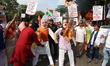 Supporters of India's main opposition Congress party protest against billionaire investor...