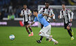 Mattia Zaccagni of S.S. Lazio and Pierre Kalulu of Juventus F.C. are in action during the...
