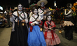 Persons take part in the Mega Procession of the Catrinas on Paseo de la Reforma Avenue, pr...