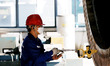 Workers work on the production line of a tower manufacturing company's workshop in Liuzhou...