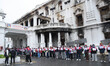 Members of Gen Z United stage a protest in front of the damaged building of the Department...