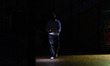 A man uses the flash of his smartphone to light his way in Kyiv, Ukraine, on October 24, 2...