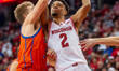 In Madison, Wisconsin, on October 29, 2025, Wisconsin Badgers guard Nick Boyd (2) drives t...