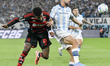Alex Sandro (left) and Luciano Vietto (right) participate in the match between Racing Club...