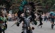 A person participates in the 2025 Dia de Muertos Parade at Paseo de la Reforma Avenue duri...