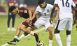 Alejandro Gomes Rodriguez of England and Diego Claut of Venezuela are in action during the...