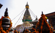 A Nepali devotee decorates the dome of the Swayambhunath Stupa, a UNESCO World Heritage Si...