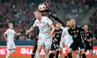 Wiktor Biedrzycki and Souleymane Cisse play during the game between Wisla Krakow and Polon...