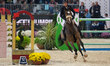 Barbara Schnieper from Switzerland rides Coco G Z and is in action during the CSI5*-W Gran...