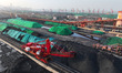 Large machinery stacks reserve coal at the coal terminal of Lianyungang Port in Jiangsu Pr...