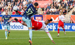 Ajax player Josip Sutalo (L) duels with Utrecht player Sebastien Haller using a bicycle ki...