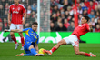 Anton Stach of Leeds United fouls Nicolas Dominguez of Nottingham Forest during the Premie...