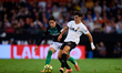 Diego Lopez of Valencia CF competes for the ball with Valentin Gomez of Real Betis Balompi...