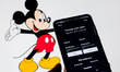 The Disney Plus subscription plan is displayed on a mobile phone with The Walt Disney Mick...