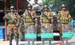 Bangladesh's army personnel stand guard around the International Crimes Tribunal in Dhaka,...