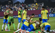 Brazil players celebrate after they win their FIFA U-17 World Cup Qatar 2025 Round of 32 m...