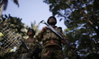 Army personnel stand guard at the International Criminal Tribunal premises in Dhaka, Bangl...
