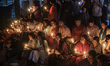 Hindu devotees perform the Ganga Aarti ritual at Ramna Kali Temple in Dhaka, Bangladesh, o...