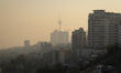 A view of northern Tehran, Iran, and the Milad telecommunication tower during polluted air...