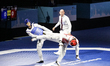 Jun Seo Bae of Korea competes against Sirawit Mahamad of Thailand in the Men's 58kg catego...
