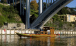 View a boat during the six bridges cruise while sailing on the Douro River in Porto, Portu...