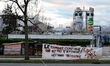 Protesters hold a banner against the closure of the Teisseire syrup factory in Crolles, Is...