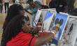 Participants engage in drawing and painting during the Firewood Jollof Festival 2.0 at Mur...
